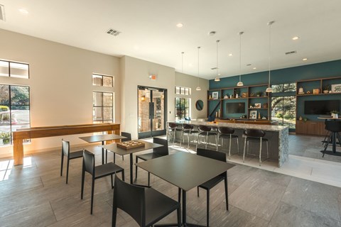 clubroom with tables and chairs at Monterey Ranch, Austin, Texas